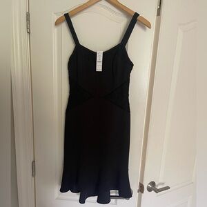 NWT White House Black Market - Black Flutter Hem dress with lace.